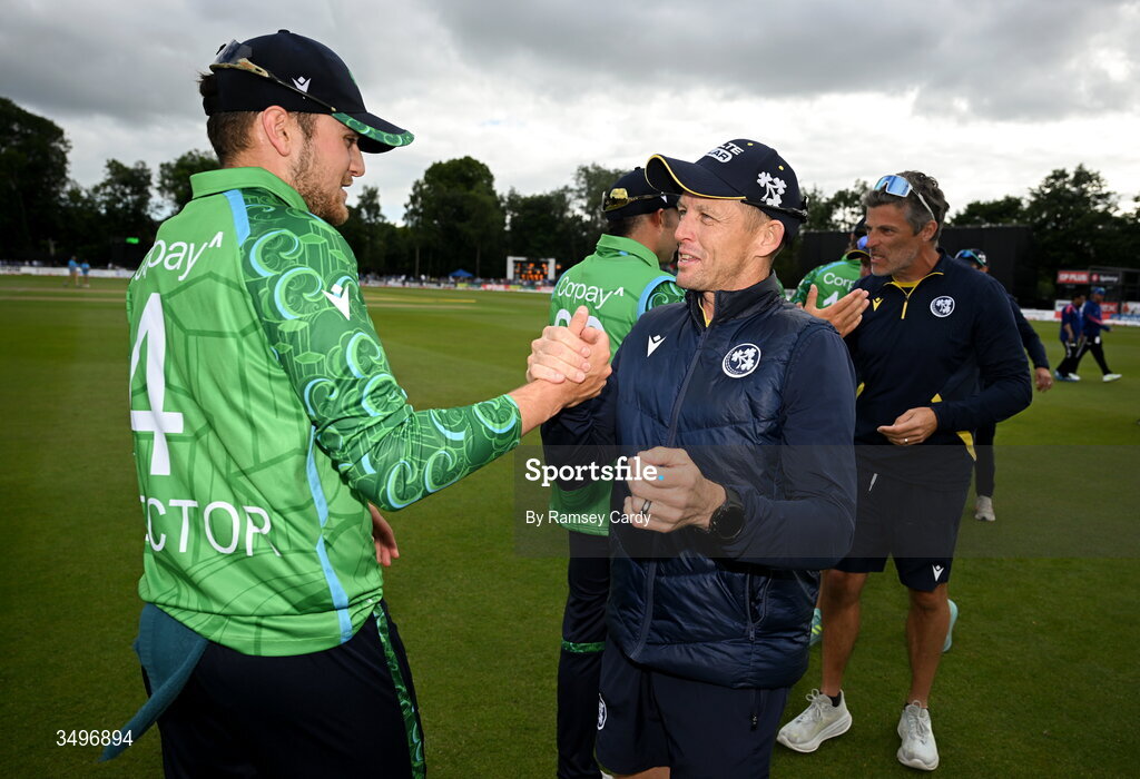 28 June 2026; Ireland head coach Heinrich Malan and Tim Tector celebrate after match two of the Spinny Cup Men's T20 International series between Ireland and India at Stormont in Belfast. Photo by Ramsey Cardy/Sportsfile