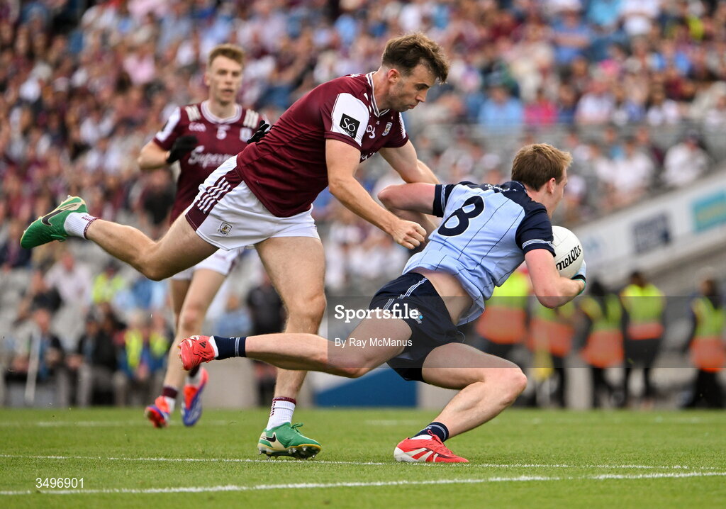 28 June 2026; Peadar Ó Cofaigh Byrne of Dublin is tackled by Paul Conroy of Galway during the GAA Football All-Ireland Senior Championship quarter-final match between Dublin and Galway at Croke Park in Dublin. Photo by Ray McManus/Sportsfile