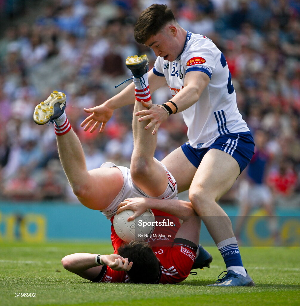 28 June 2026; James Maguire of Louth is tackled by Darragh McElearney of Monaghan during the GAA Football All-Ireland Senior Championship quarter-final match between Louth and Monaghan at Croke Park in Dublin. Photo by Ray McManus/Sportsfile