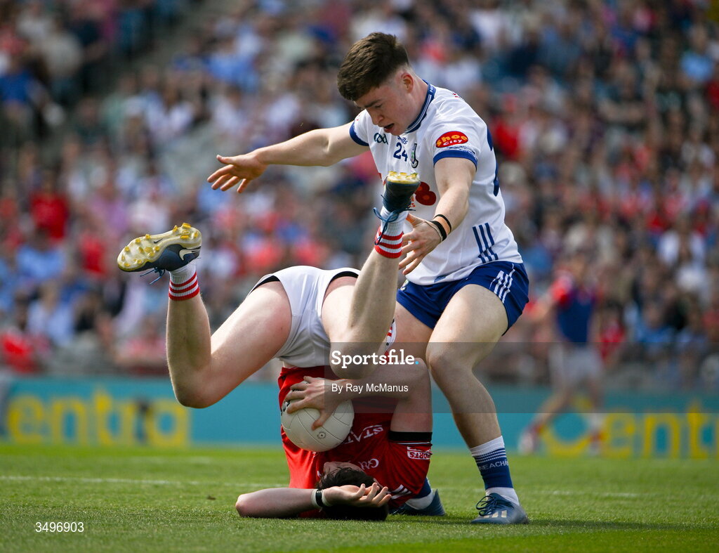 28 June 2026; James Maguire of Louth is tackled by Darragh McElearney of Monaghan during the GAA Football All-Ireland Senior Championship quarter-final match between Monaghan and Louth at Croke Park in Dublin. Photo by Ray McManus/Sportsfile