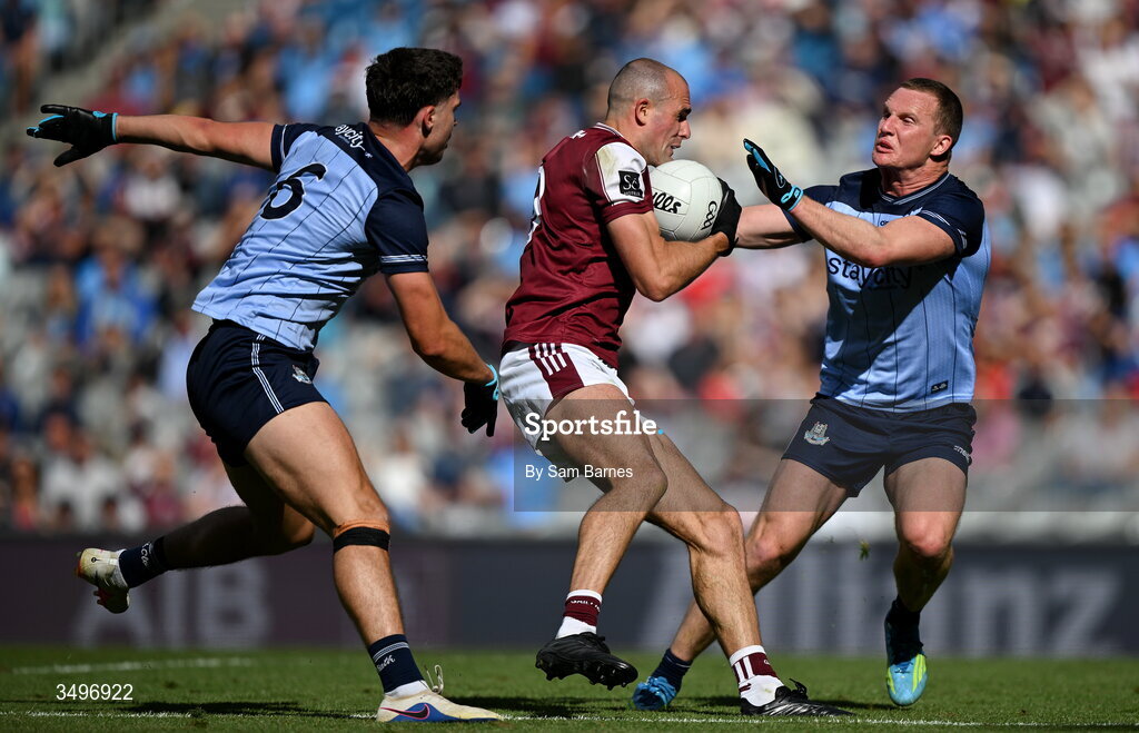 28 June 2026; John Maher of Galway in action against Theo Clancy, left, and and Ciaran Kilkenny of Dublin  during the GAA Football All-Ireland Senior Championship quarter-final match between Dublin and Galway at Croke Park in Dublin. Photo by Sam Barnes/Sportsfile