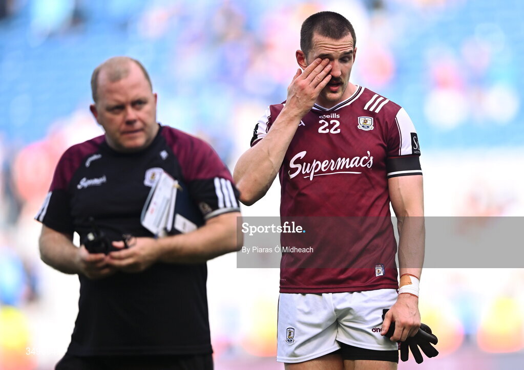 28 June 2026; Galway footballer Céin D'Arcy and Galway selector Mickey Graham after their side's defeat in the GAA Football All-Ireland Senior Championship quarter-final match between Dublin and Galway at Croke Park in Dublin. Photo by Piaras Ó Mídheach/Sportsfile