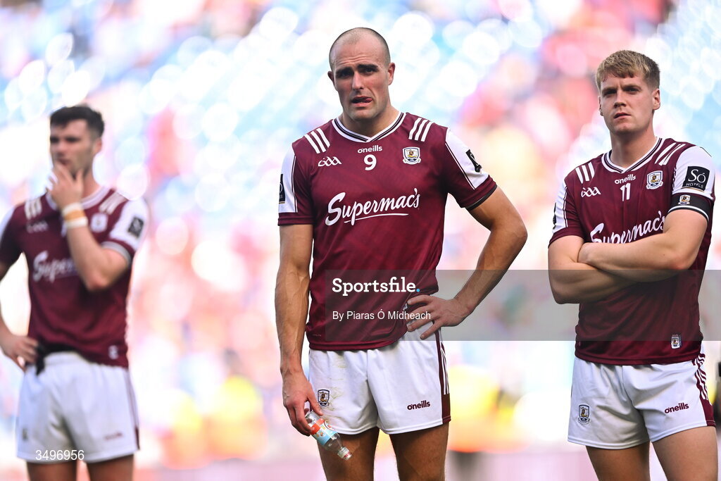 28 June 2026; Galway players, from left, Séan Mulkerrin, John Maher and Shane McGrath after their side's defeat in the GAA Football All-Ireland Senior Championship quarter-final match between Dublin and Galway at Croke Park in Dublin. Photo by Piaras Ó Mídheach/Sportsfile