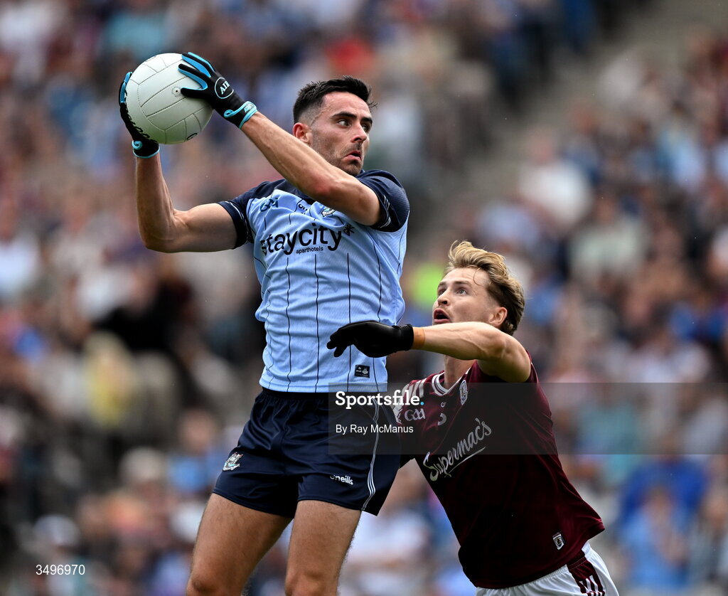 28 June 2026; Niall Scully of Dublin is tackled by Cian Hernon of Galway during the GAA Football All-Ireland Senior Championship quarter-final match between Dublin and Galway at Croke Park in Dublin. Photo by Ray McManus/Sportsfile