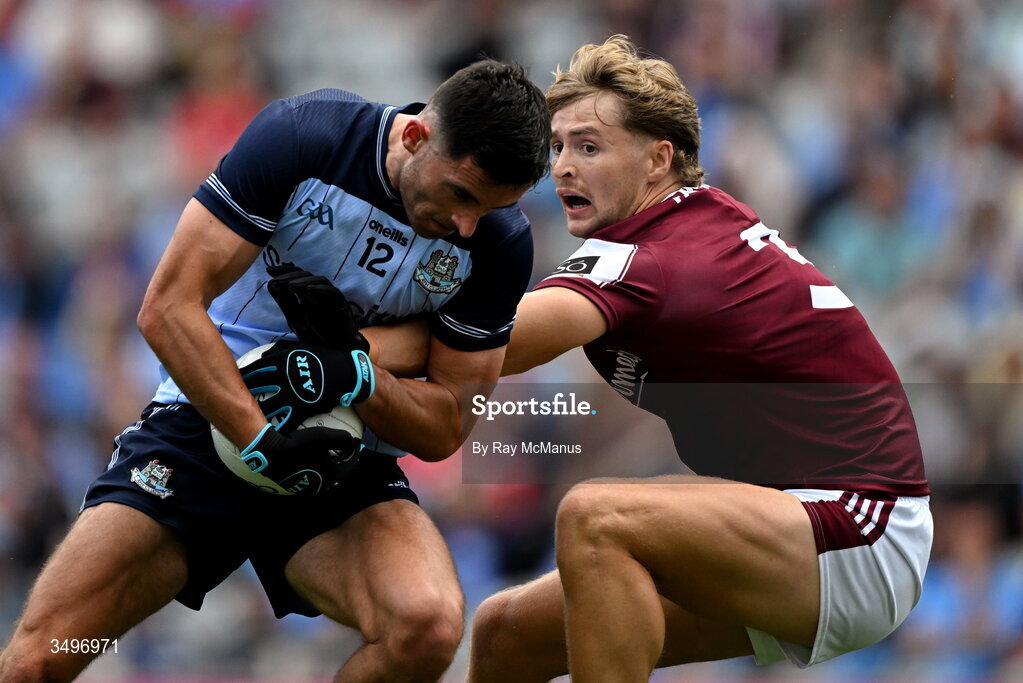 28 June 2026; Niall Scully of Dublin is tackled by Cian Hernon of Galway during the GAA Football All-Ireland Senior Championship quarter-final match between Dublin and Galway at Croke Park in Dublin. Photo by Ray McManus/Sportsfile