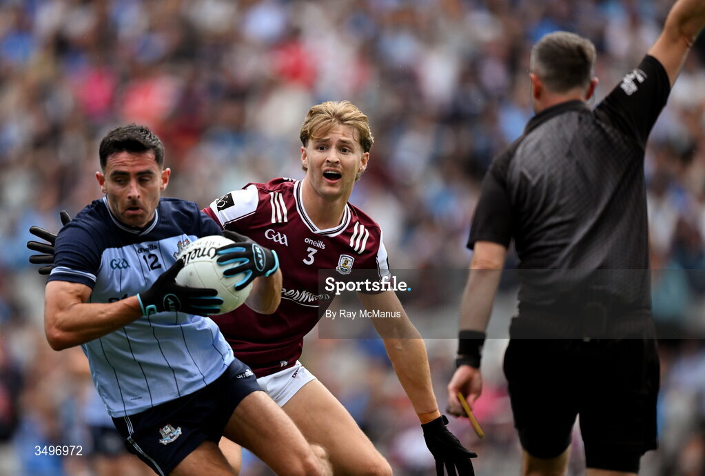 28 June 2026; Referee David Gough signals a free as Niall Scully of Dublin is tackled by Cian Hernon of Galway during the GAA Football All-Ireland Senior Championship quarter-final match between Dublin and Galway at Croke Park in Dublin. Photo by Ray McManus/Sportsfile
