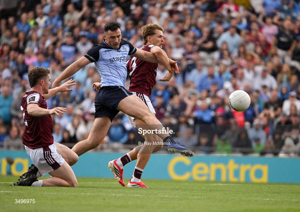 28 June 2026; Colm Basquel of Dublin has a shot on goal despite the attention of Galway players Jack Glynn, left, and Cian Hernon during the GAA Football All-Ireland Senior Championship quarter-final match between Dublin and Galway at Croke Park in Dublin. Photo by Ray McManus/Sportsfile
