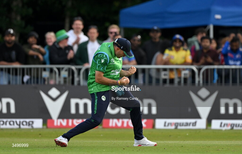 28 June 2026; Liam McCarthy of Ireland celebrates taking the wicket of Tilak Varma of India during match two of the Spinny Cup Men's T20 International series between Ireland and India at Stormont in Belfast. Photo by Ramsey Cardy/Sportsfile