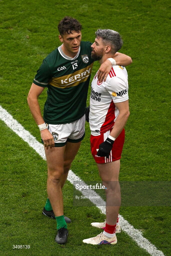 27 June 2026; Mattie Donnelly of Tyrone, right, is consoled by David Clifford of Kerry after the GAA Football All-Ireland Senior Championship quarter-final match between Kerry and Tyrone at Croke Park in Dublin. Photo by Sam Barnes/Sportsfile