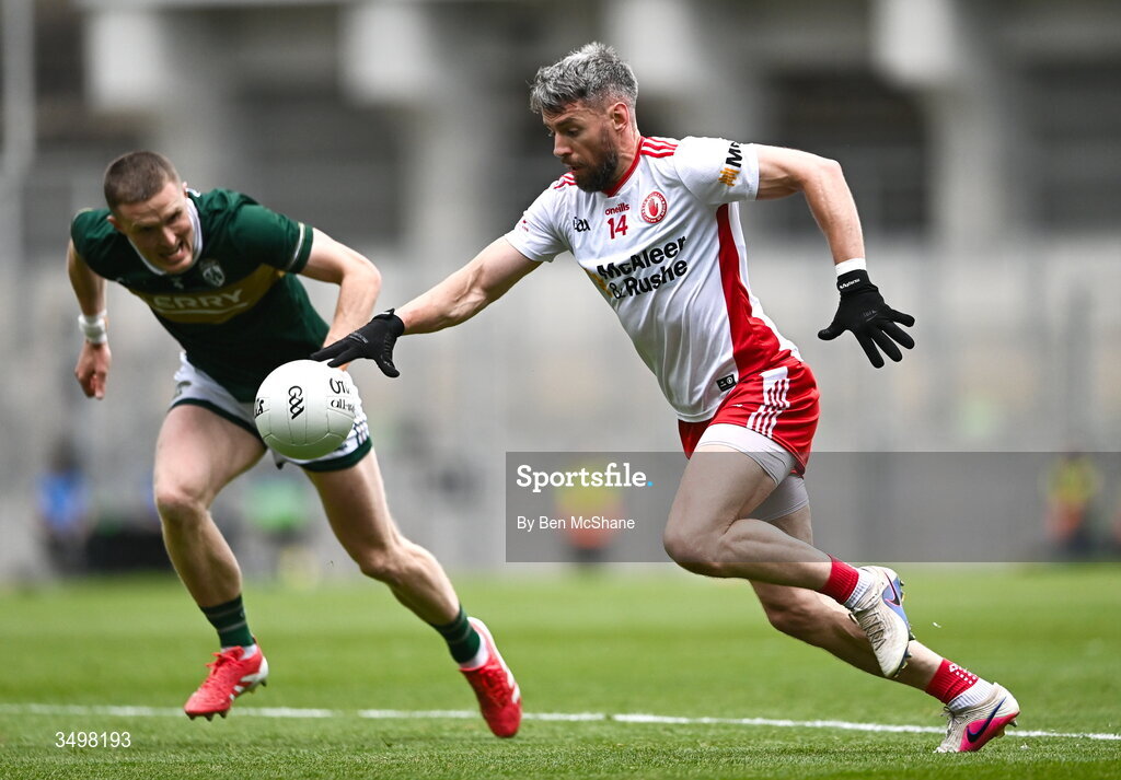 27 June 2026; Mattie Donnelly of Tyrone and Jason Foley of Kerry during the GAA Football All-Ireland Senior Championship quarter-final match between Kerry and Tyrone at Croke Park in Dublin. Photo by Ben McShane/Sportsfile