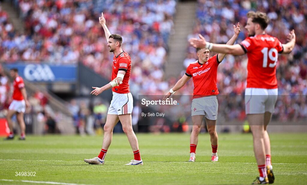 28 June 2026; Ciaran Downey of Louth, left, during the GAA Football All-Ireland Senior Championship quarter-final match between Louth and Monaghan at Croke Park in Dublin. Photo by Seb Daly/Sportsfile