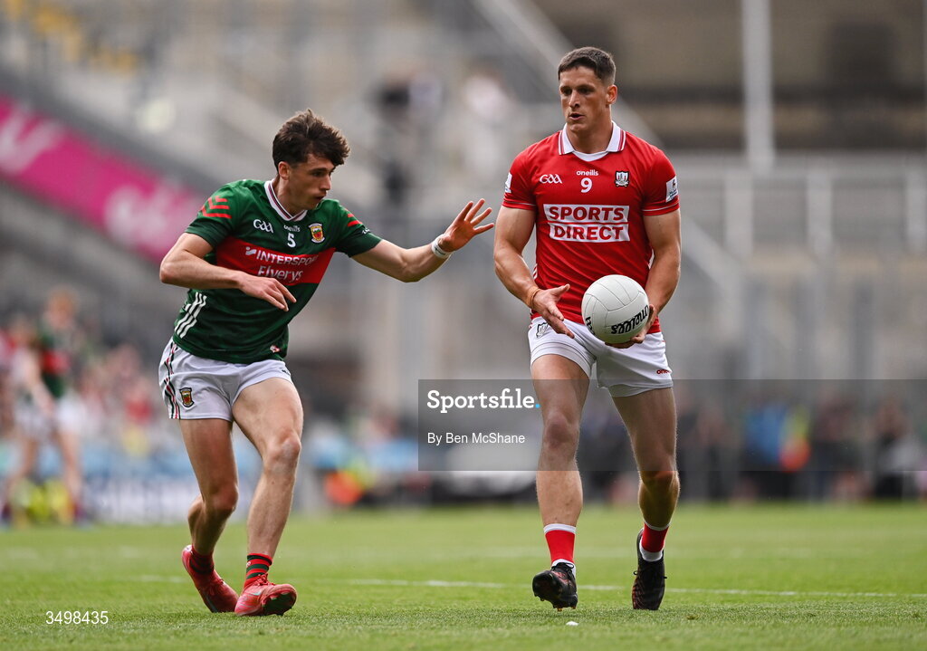 27 June 2026; Colm O'Callaghan of Cork and Sam Callinan of Mayo during the GAA Football All-Ireland Senior Championship quarter-final match between Cork and Mayo at Croke Park in Dublin. Photo by Ben McShane/Sportsfile