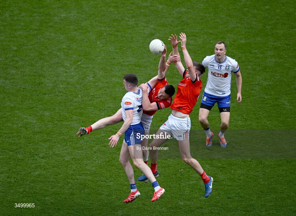 28 June 2026; Mícheál McCarville of Monaghan in action against Conor Grimes, left, and Dara McDonnell of Louth during the GAA Football All-Ireland Senior Championship quarter-final match between Louth and Monaghan at Croke Park in Dublin. Photo by Daire Brennan/Sportsfile