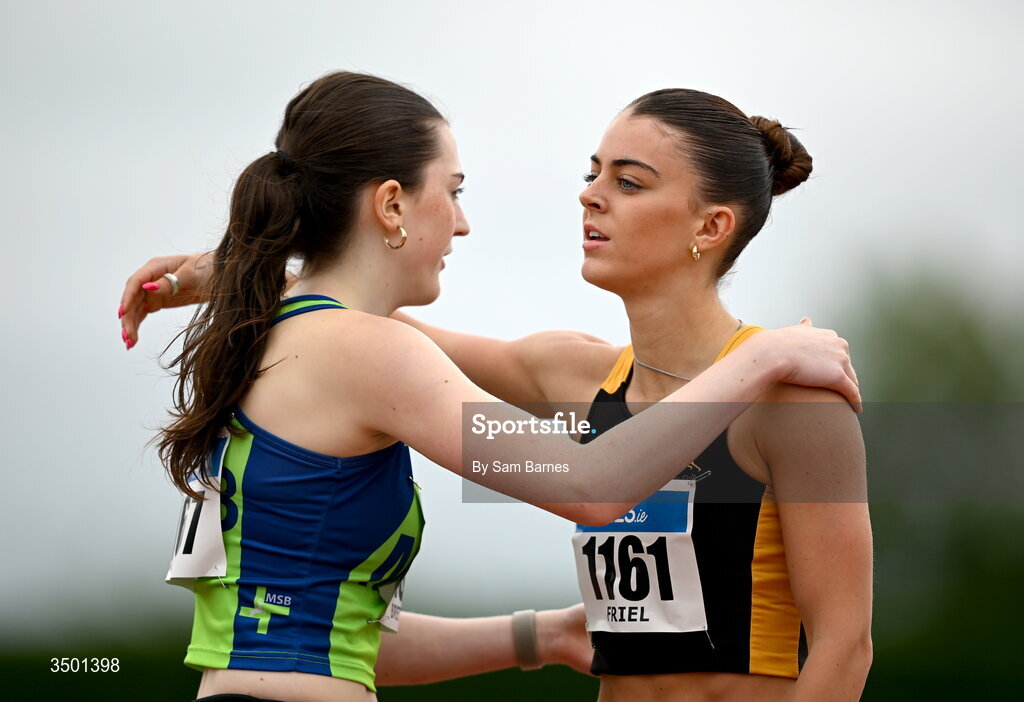 4 July 2026; Erin Friel of Letterkenny AC, Donegal, right, embraces Mia Brett of Metro/St Brigids AC, Dublin, after their under 20 women's 400m heat during day one of the 123.ie National U20 & U23 Track & Field Championships at Tullamore Harriers Athletics Club in Tullamore, Offaly. Photo by Sam Barnes/Sportsfile