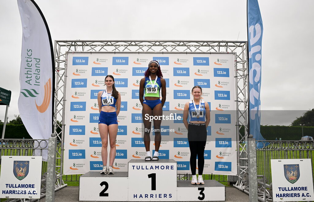 4 July 2026; Under 20 women's 100m medallists, Chidinma Adikaibe of Metro/St Brigids AC, Dublin, centre, gold, Nicole Doherty of Ratoath AC, Meath, left, silver, and Alisha Maher of Tullamore Harriers AC, Offaly, right, bronze, during day one of the 123.ie National U20 & U23 Track & Field Championships at Tullamore Harriers Athletics Club in Tullamore, Offaly. Photo by Sam Barnes/Sportsfile