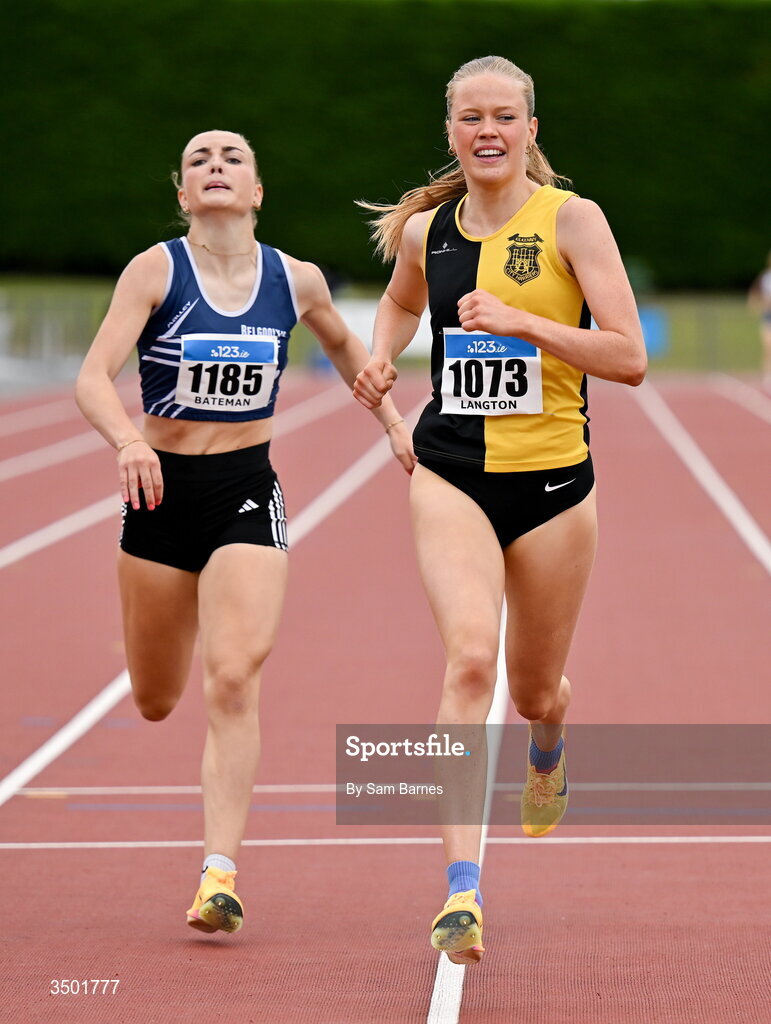 4 July 2026; Pia Langton of Kilkenny City Harriers AC, right, on her way to winning the under 20 women's 800m in a championship record of  2:08.15, ahead of Freya Bateman of Belgooly AC, left, during day one of the 123.ie National U20 & U23 Track & Field Championships at Tullamore Harriers Athletics Club in Tullamore, Offaly. Photo by Sam Barnes/Sportsfile