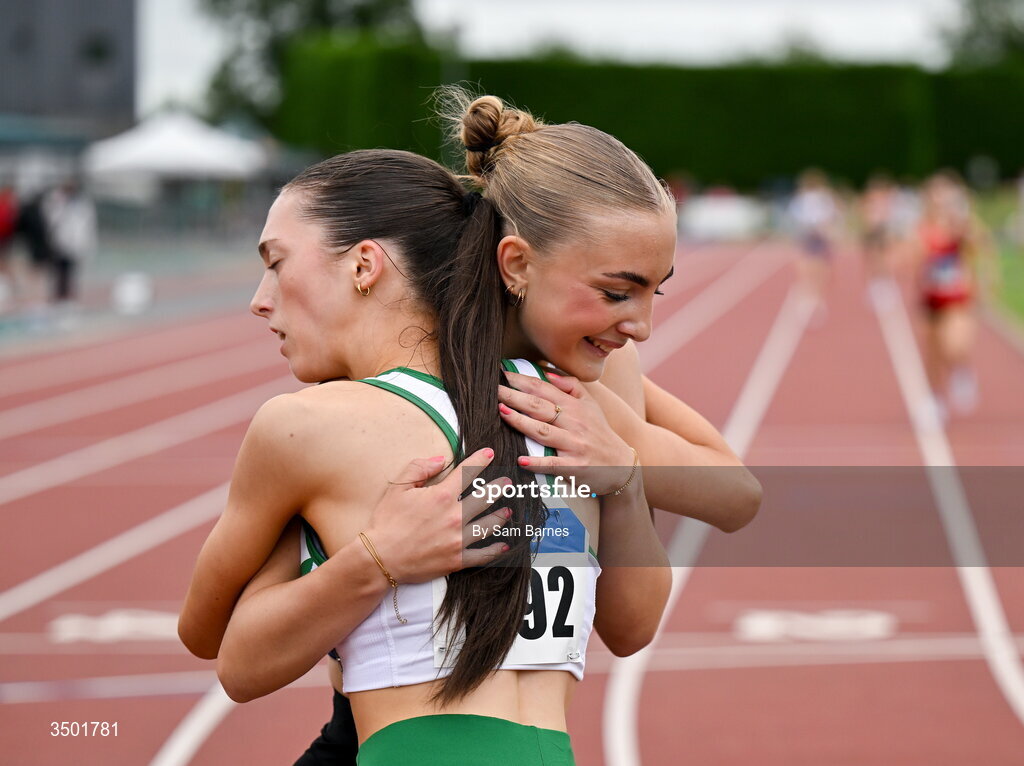 4 July 2026; Freya Bateman of Belgooly AC and Freyja O'Carroll of Raheny Shamrock AC, embrace after the under 20 women's 800m during day one of the 123.ie National U20 & U23 Track & Field Championships at Tullamore Harriers Athletics Club in Tullamore, Offaly. Photo by Sam Barnes/Sportsfile