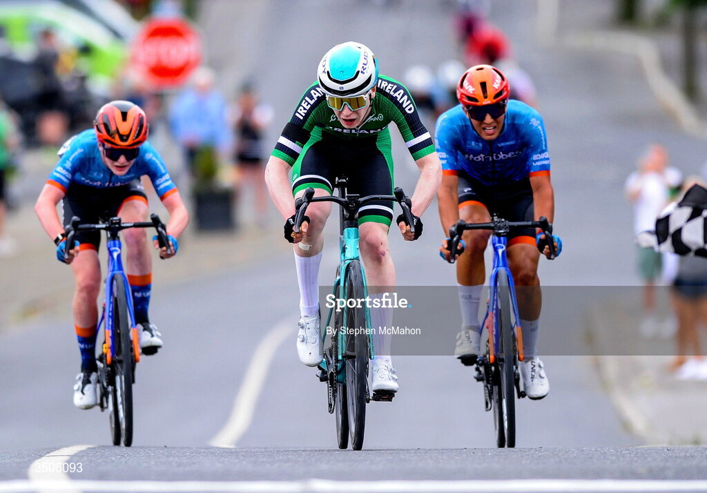 9 July 2026; Rian McCrystal of Cycling Ireland, centre, after winning Stage 3 of 2026 Junior Tour of Ireland in East Clare. Photo by Stephen McMahon/Sportsfile