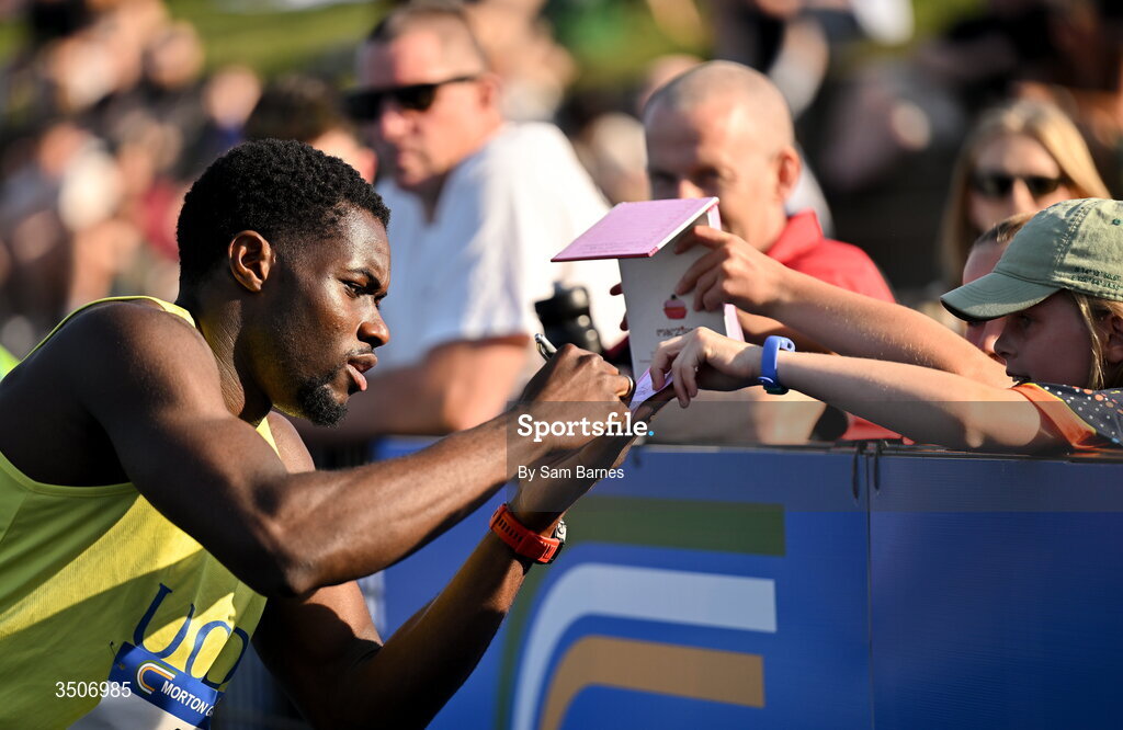 10 July 2026; Bori Akinola of Ireland signs an autograph after winning the Athletics Leinster men's 100m heats during the Morton Games at Morton Stadium in Santry, Dublin. Photo by Sam Barnes/Sportsfile