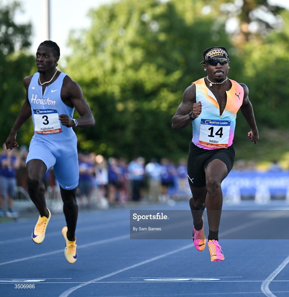 10 July 2026; Christian Miller of United States, right, crosses the finish line to win in the Athletics Leinster men's 100m heats during the Morton Games at Morton Stadium in Santry, Dublin. Photo by Sam Barnes/Sportsfile