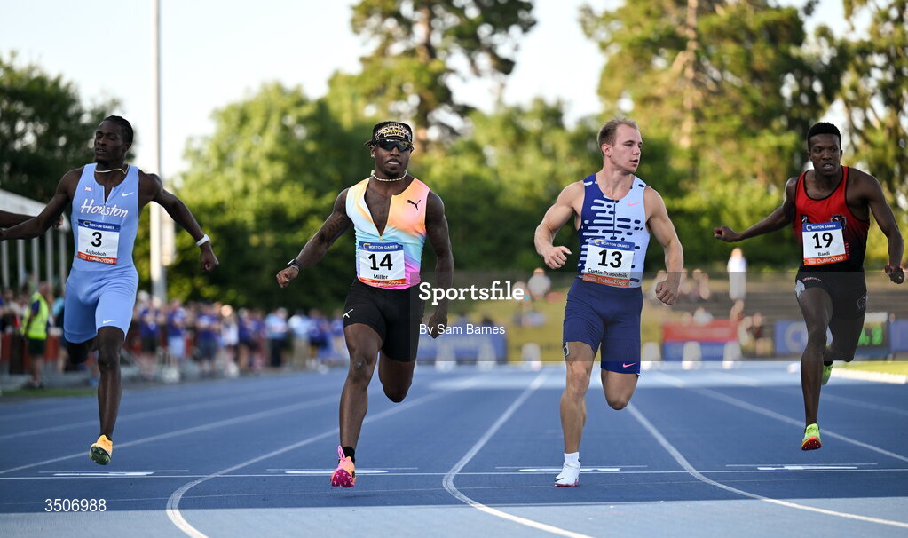 10 July 2026; Christian Miller of United States, second from left, crosses the finish line to win in the Athletics Leinster men's 100m heats during the Morton Games at Morton Stadium in Santry, Dublin. Photo by Sam Barnes/Sportsfile