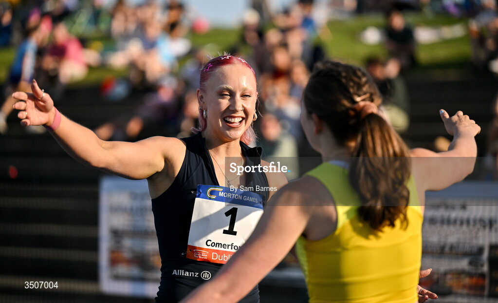10 July 2026; Orla Comerford of Ireland, left, is congratulated by Lana Sutton of Ireland after winning the Allianz women's mixed class para 100m and to break a new European record with a time of 11.72 during the Morton Games at Morton Stadium in Santry, Dublin. Photo by Sam Barnes/Sportsfile