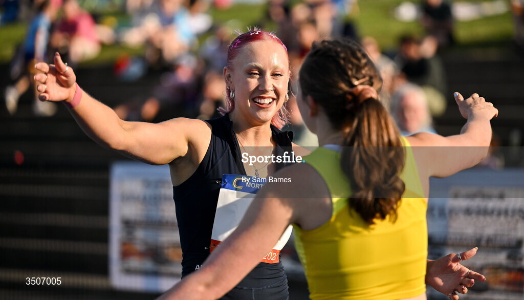 10 July 2026; Orla Comerford of Ireland, left, is congratulated by Lana Sutton of Ireland after winning the Allianz women's mixed class para 100m and to break a new European record with a time of 11.72 during the Morton Games at Morton Stadium in Santry, Dublin. Photo by Sam Barnes/Sportsfile