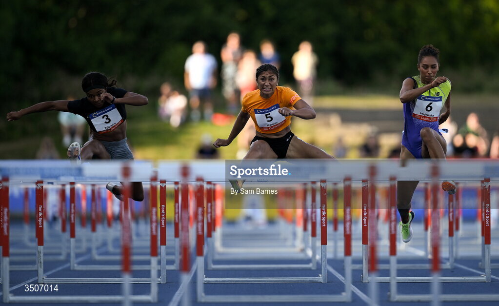 10 July 2026; Emma Nwofor of Great Britain, centre, competes in the Davy women's 100m hurdles during the Morton Games at Morton Stadium in Santry, Dublin. Photo by Sam Barnes/Sportsfile