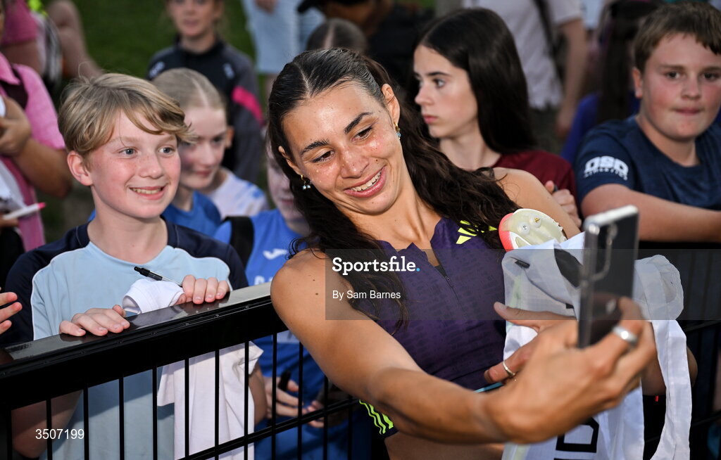 10 July 2026; Sophie O'Sullivan of Ireland poses for a selfie with supporters during the Morton Games at Morton Stadium in Santry, Dublin. Photo by Sam Barnes/Sportsfile
