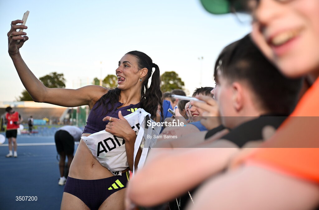 10 July 2026; Sophie O'Sullivan of Ireland poses for a selfie with supporters during the Morton Games at Morton Stadium in Santry, Dublin. Photo by Sam Barnes/Sportsfile