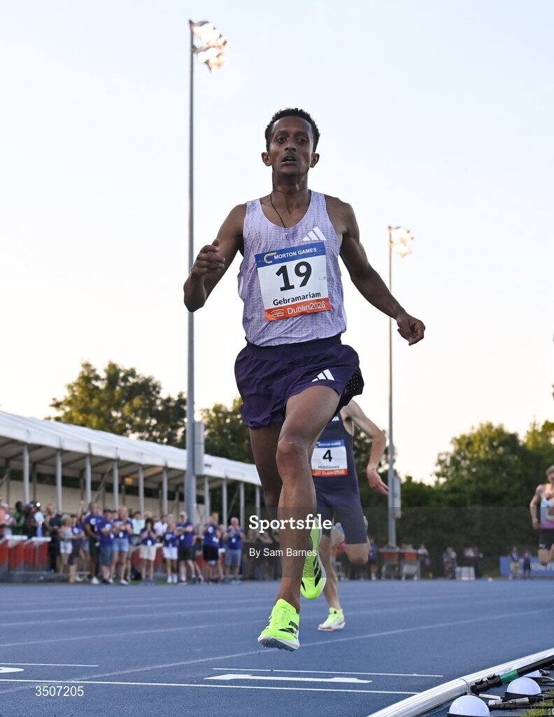 10 July 2026; Aron Gebramariam of Athlete Refugee Team crosses the finish line to win the Albie Thomas Family / Dublin Athletics men's 5000m during the Morton Games at Morton Stadium in Santry, Dublin. Photo by Sam Barnes/Sportsfile