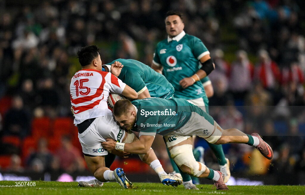11 July 2026; Takuro Matsunaga of Japan is tackled by Sean Jansen, right, and Tadhg Beirne of Ireland during the 2026 Nations Championship Round Two match between Japan and Ireland at McDonald Jones Stadium in Newcastle, Australia. Photo by Brendan Moran/Sportsfile
