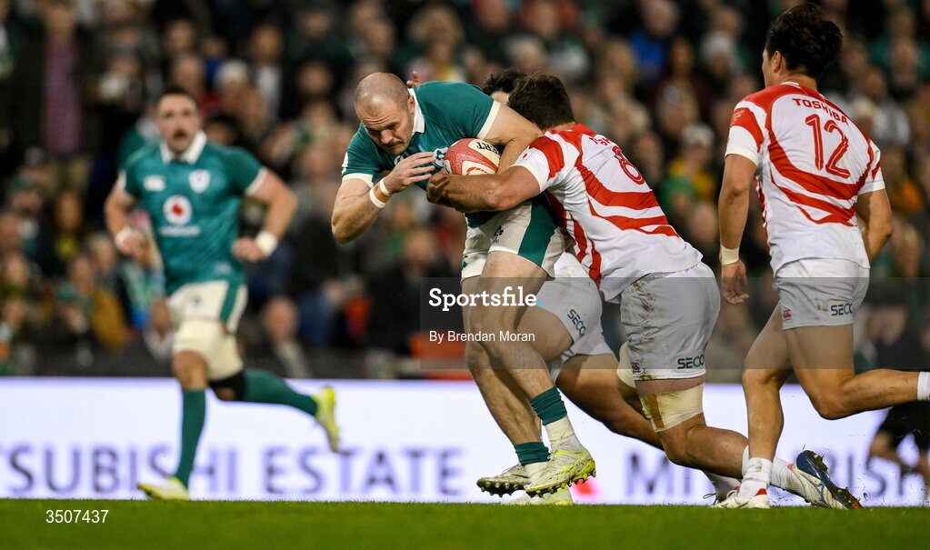 11 July 2026; Jacob Stockdale of Ireland is tackled by Jack Cornelsen of Japan during the 2026 Nations Championship Round Two match between Japan and Ireland at McDonald Jones Stadium in Newcastle, Australia. Photo by Brendan Moran/Sportsfile