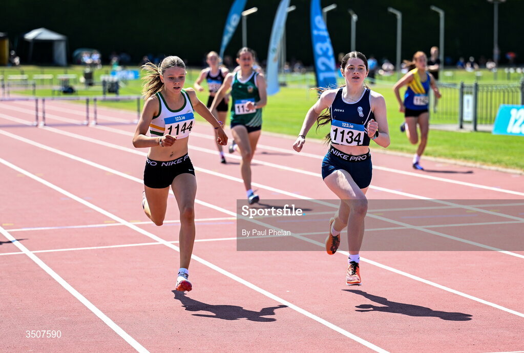 11 July 2026; Ruby Cunnane of Corran A.C., right, on her way to winning and Zoe Dunne of St. Abbans A.C., left, on her way to coming second in the U16 girl's 250m Hurdles during day three of the 123.ie National Championships at Tullamore Harriers Athletics Club in Tullamore, Offaly. Photo by Paul Phelan/Sportsfile