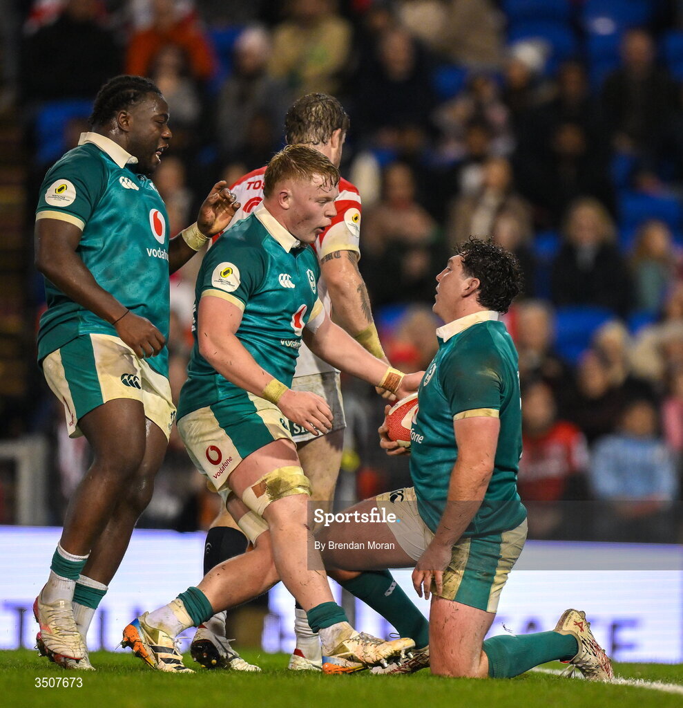 11 July 2026; Tom Stewart of Ireland, right, celebrates with teammates Bryn Ward, centre, and Sam Illo after scoring Ireland's last try during the 2026 Nations Championship Round Two match between Japan and Ireland at McDonald Jones Stadium in Newcastle, Australia. Photo by Brendan Moran/Sportsfile