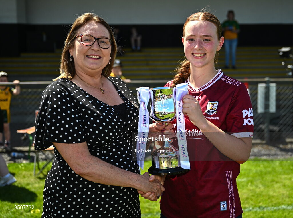 11 July 2026; Ladies Gaelic Football Association President, Trina Murray presents the trophy to Galway captain Klara Banek after the 2026 LGFA All-Ireland U20 final match between Donegal and Galway at Kilcoyne Memorial Park in Tubbercurry, Sligo. Photo by David Fitzgerald/Sportsfile