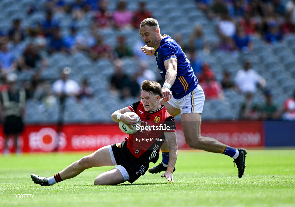 11 July 2026; Miceal Rooney of Down is tackled by Dean Healy of Wicklow during the Tailteann Cup final match between Down and Wicklow at Croke Park in Dublin. Photo by Ray McManus/Sportsfile