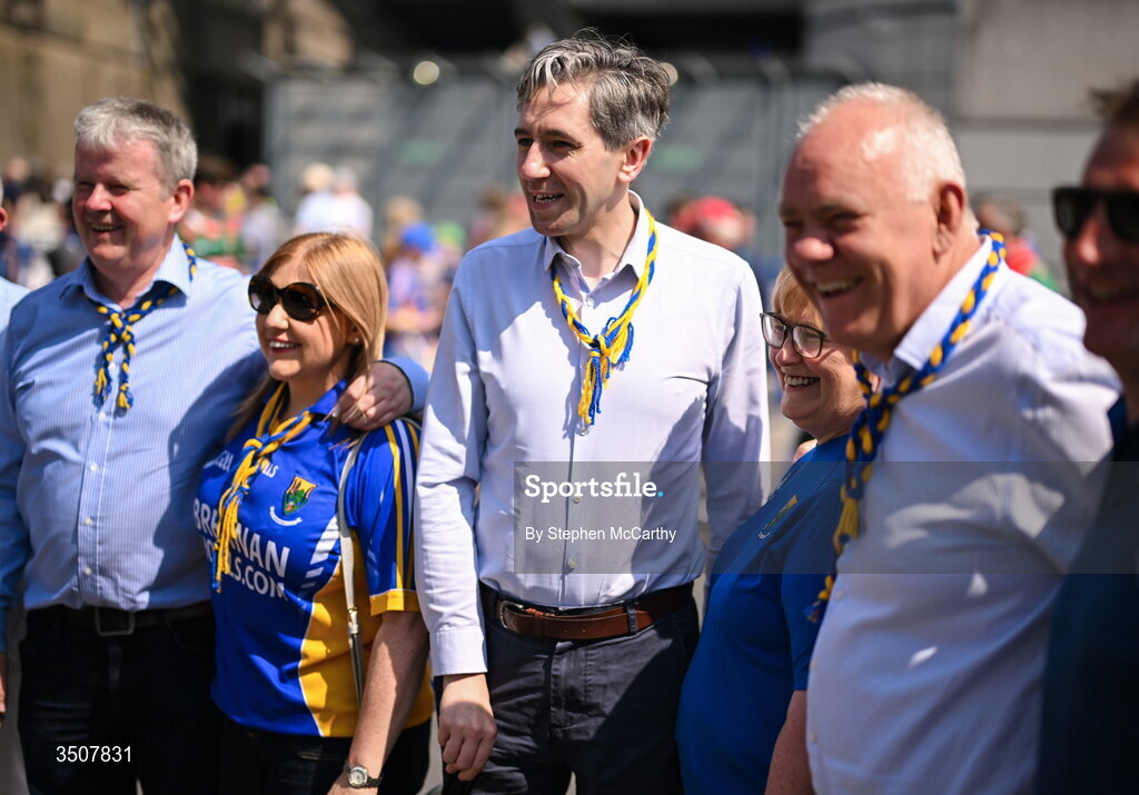 11 July 2026; Wicklow supporter and Tánaiste Simon Harris TD, centre, before the Tailteann Cup final match between Down and Wicklow at Croke Park in Dublin. Photo by Stephen McCarthy/Sportsfile