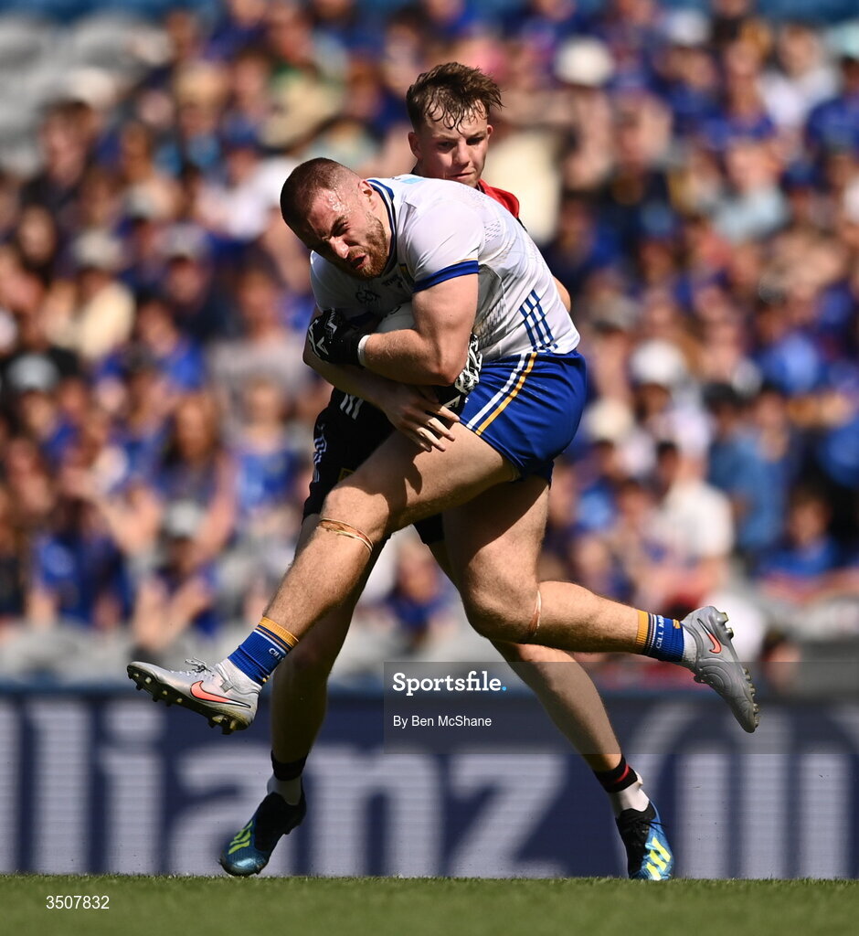 11 July 2026; Wicklow goalkeeper Mark Jackson is tackled by Eamon Brown of Down during the Tailteann Cup final match between Down and Wicklow at Croke Park in Dublin. Photo by Ben McShane/Sportsfile