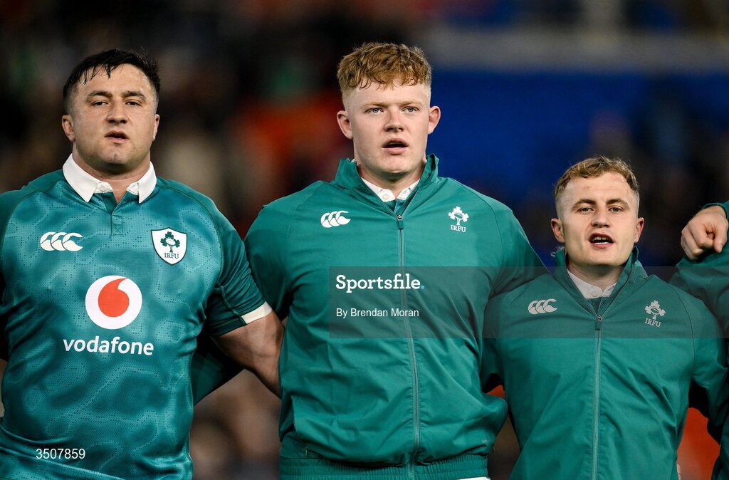 11 July 2026; Ireland players, from left, Thomas Clarkson, Bryn Ward and Craig Casey during the national anthems before the 2026 Nations Championship Round Two match between Japan and Ireland at McDonald Jones Stadium in Newcastle, Australia. Photo by Brendan Moran/Sportsfile