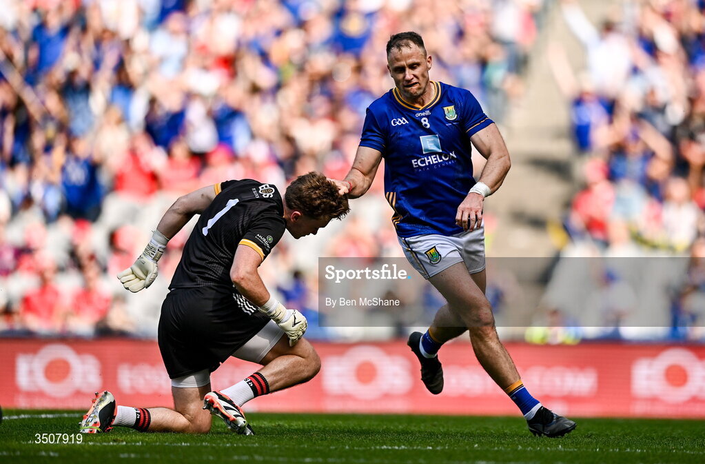 11 July 2026; Dean Healy of Wicklow collides with Down goalkeeper Ronan Burns after scoring his side's first goal during the Tailteann Cup final match between Down and Wicklow at Croke Park in Dublin. Photo by Ben McShane/Sportsfile