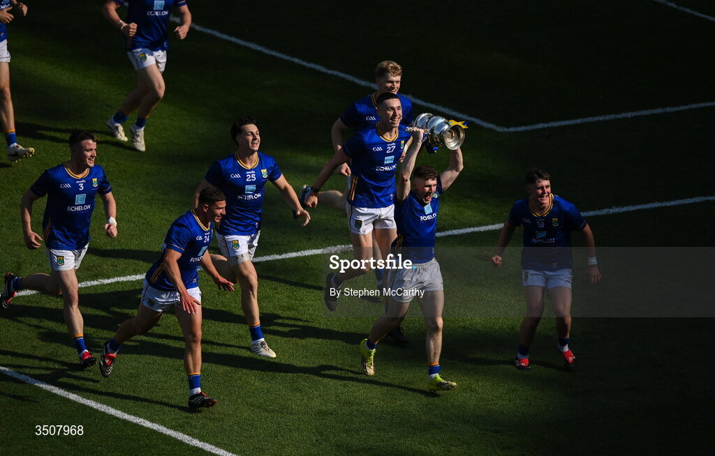 11 July 2026; Tom Moran of Wicklow and teammates celebrate with the Tailteann Cup after the Tailteann Cup final match between Down and Wicklow at Croke Park in Dublin. Photo by Stephen McCarthy/Sportsfile