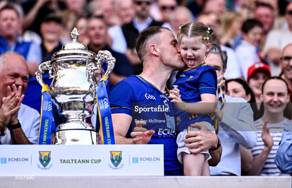 11 July 2026; Wicklow captain Dean Healy with his daughter Fiádh after the Tailteann Cup final match between Down and Wicklow at Croke Park in Dublin. Photo by Ben McShane/Sportsfile