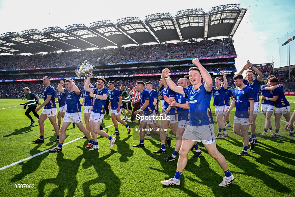 11 July 2026; Wicklow players celebrate with the Tailteanne Cup after the Tailteann Cup final match between Down and Wicklow at Croke Park in Dublin. Photo by Ben McShane/Sportsfile
