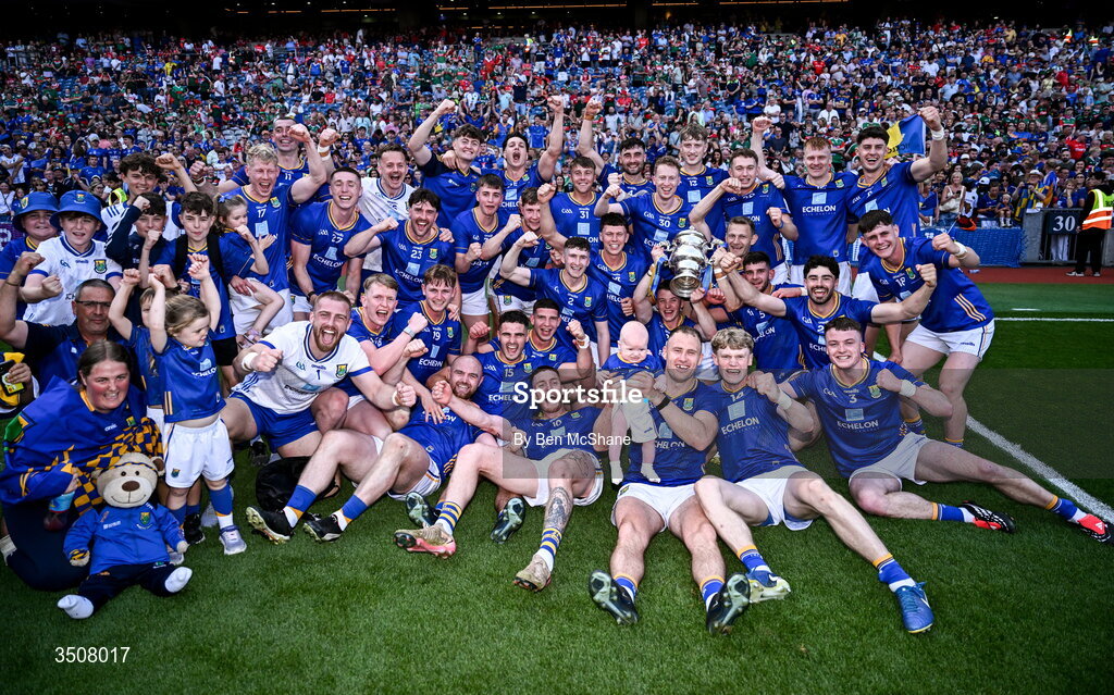 11 July 2026; Wicklow players celebrate with the Tailteanne Cup after the Tailteann Cup final match between Down and Wicklow at Croke Park in Dublin. Photo by Ben McShane/Sportsfile