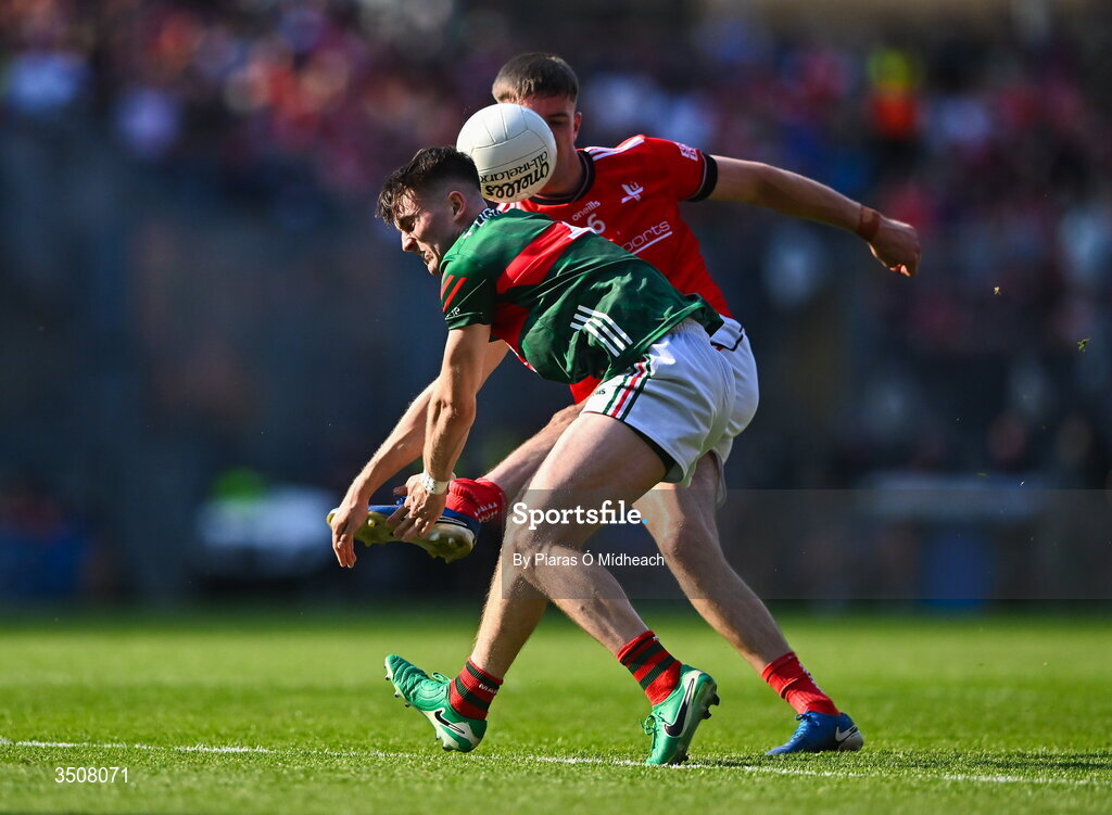 11 July 2026; Eoin McGreal of Mayo blocks down a shot from Dara McDonnell of Louth during the GAA Football All-Ireland Senior Championship semi-final match between Mayo and Louth at Croke Park in Dublin. Photo by Piaras Ó Mídheach/Sportsfile