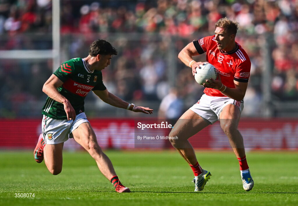 11 July 2026; Conor Grimes of Louth in action against Sam Callinan of Mayo during the GAA Football All-Ireland Senior Championship semi-final match between Mayo and Louth at Croke Park in Dublin. Photo by Piaras Ó Mídheach/Sportsfile
