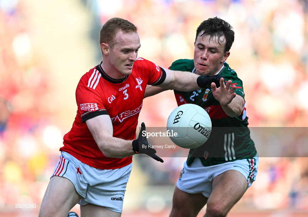 11 July 2026; Donal McKenny of Louth in action against Paul Towey of Mayo during the GAA Football All-Ireland Senior Championship semi-final match between Mayo and Louth at Croke Park in Dublin. Photo by Ramsey Cardy/Sportsfile