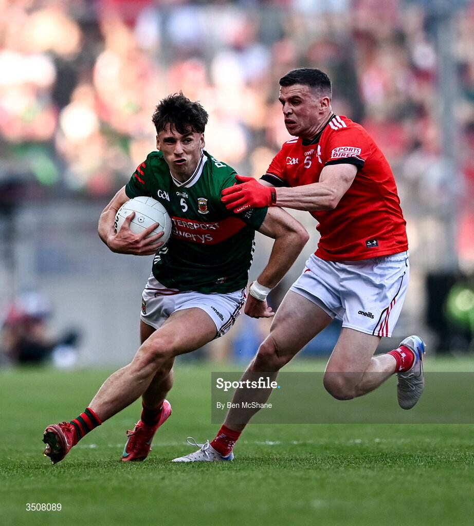 11 July 2026; Sam Callinan of Mayo is tackled by Conal McKeever of Louth during the GAA Football All-Ireland Senior Championship semi-final match between Mayo and Louth at Croke Park in Dublin. Photo by Ben McShane/Sportsfile