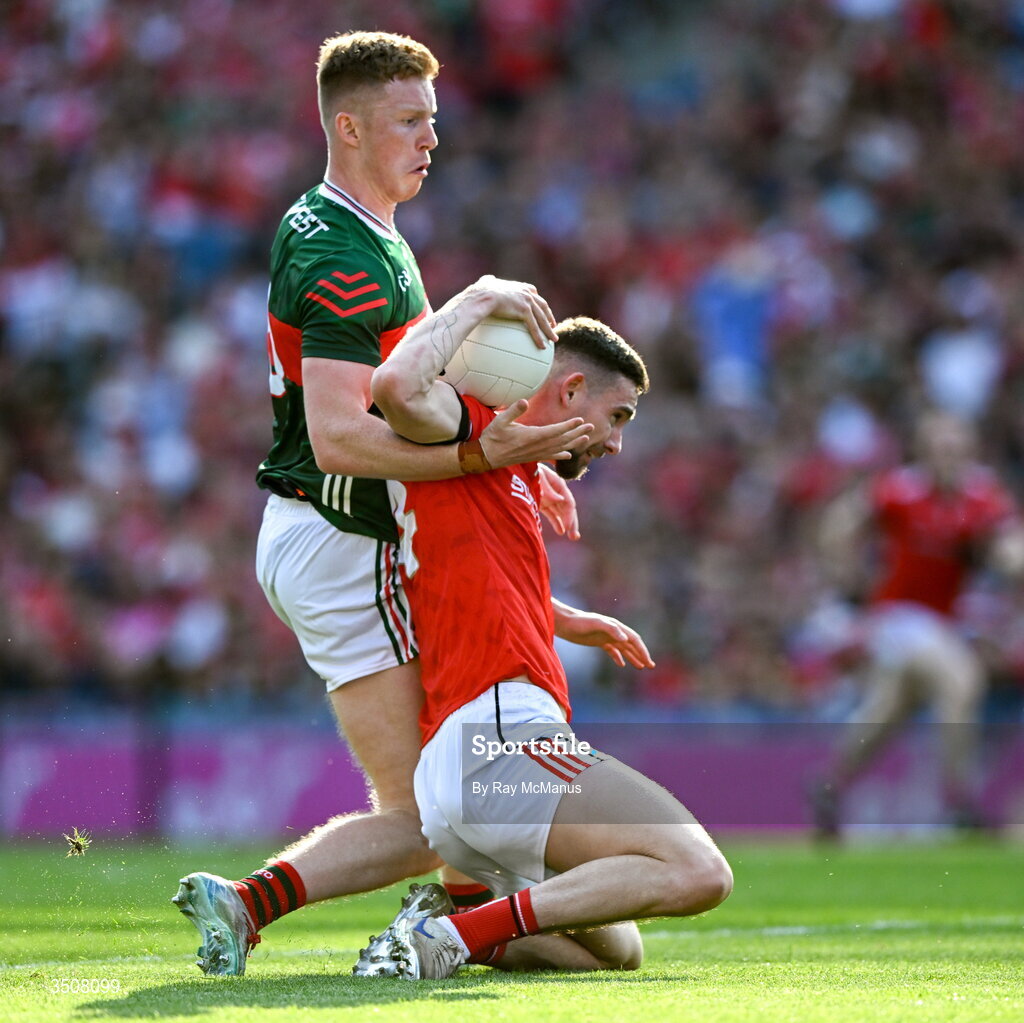11 July 2026; Ciaran Downey of Louth is tackled by David McBrien of Mayo during the GAA Football All-Ireland Senior Championship semi-final match between Mayo and Louth at Croke Park in Dublin. Photo by Ray McManus/Sportsfile